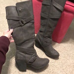 Tall heeled blowfish boots